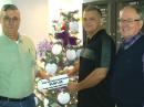 (L-R) PCARS President Rick Kruis. K8CAV, Mark Frisone, chief executive officer of Family & Community Services, PCARS Vice President Jim Wilson, AC8NT.